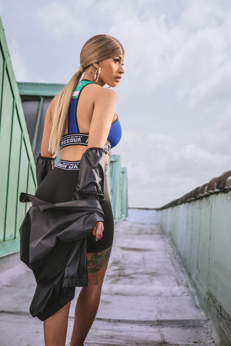 Cardi B Reebok Meet You There Collection Campaign Sports Bra Blue Biker Shorts Black