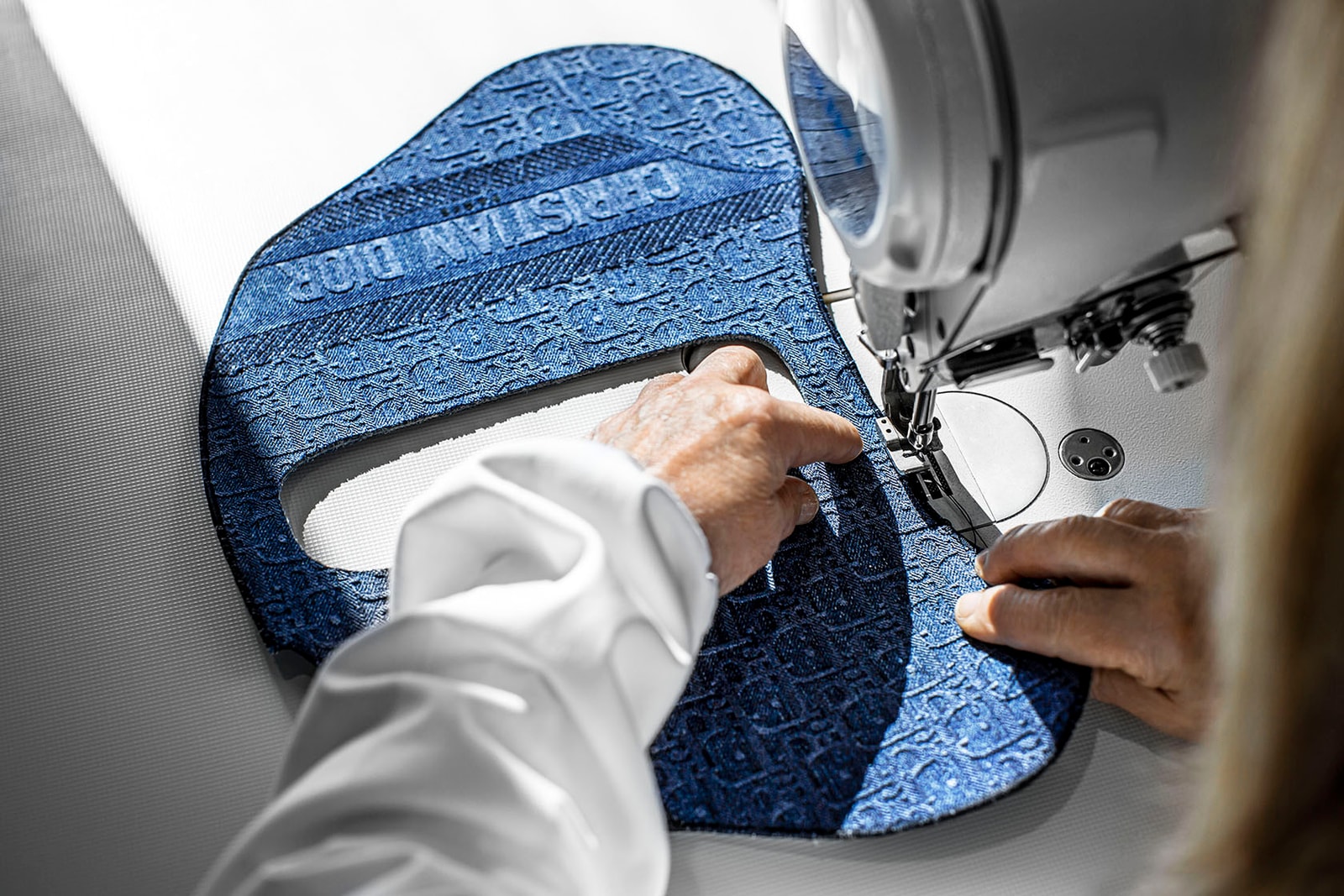 dior saddle bag how its made embroidered denim monogram blue stitching gold hardware