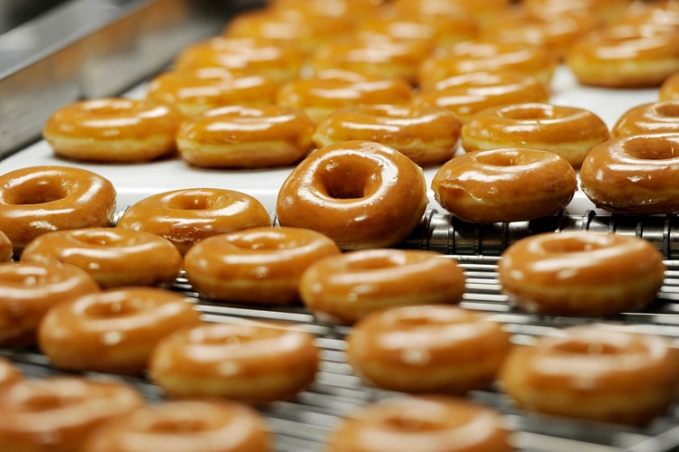 Treat Yourself to Krispy Kreme's Glazed Donuts Finished off with Kit Kats