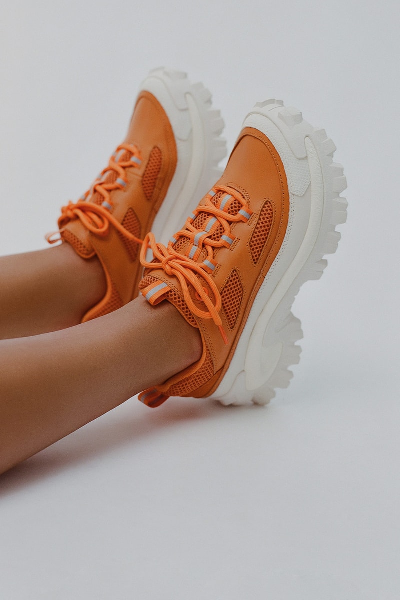 cat footwear axel arigato collaboration excelsior orange sneakers shoes