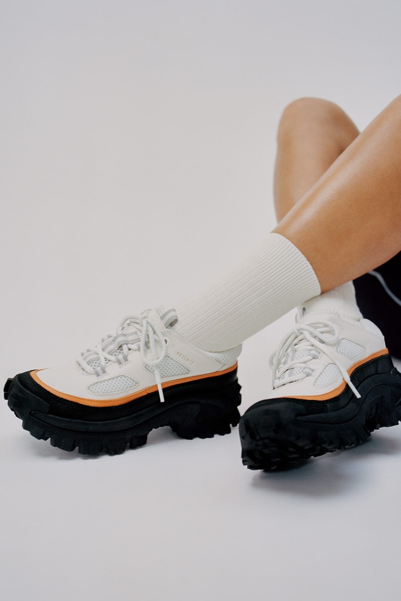 cat footwear axel arigato collaboration excelsior orange sneakers shoes