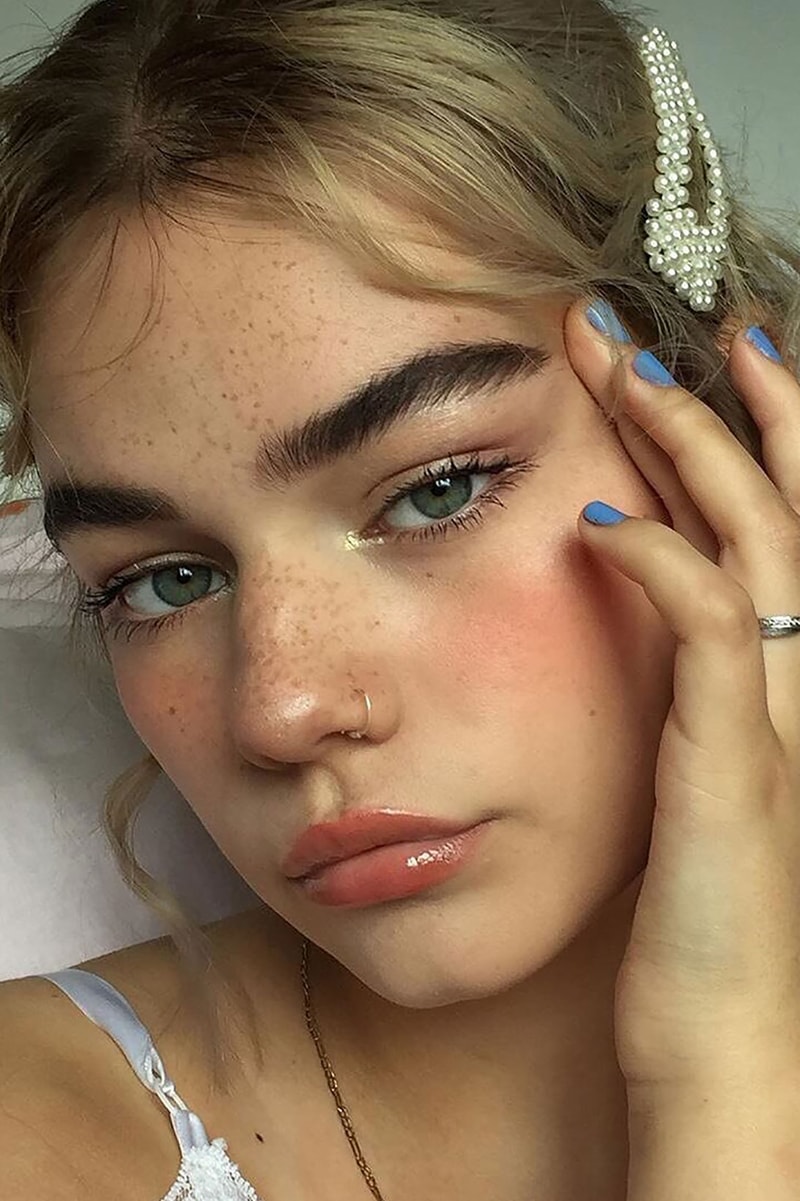 eyebrow tinting makeup lip gloss eyelashes mascara blue nail polish ring green eyes