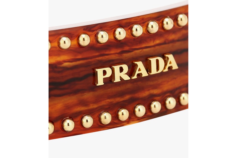 prada embellished logo hair clip brown gold accessory
