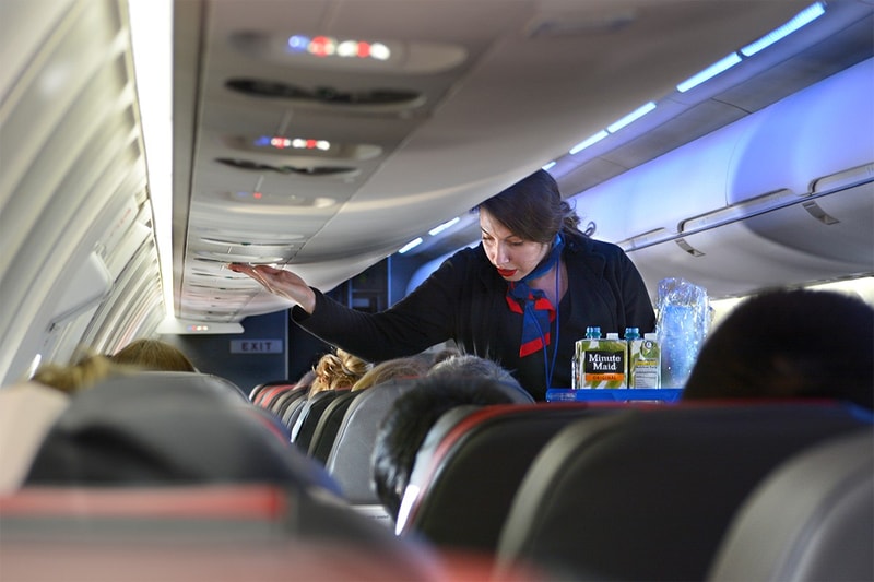 Airlines Ban Alcohol on Planes Due to Coronavirus Concerns Travel COVID-19 Spread Passenger Interaction