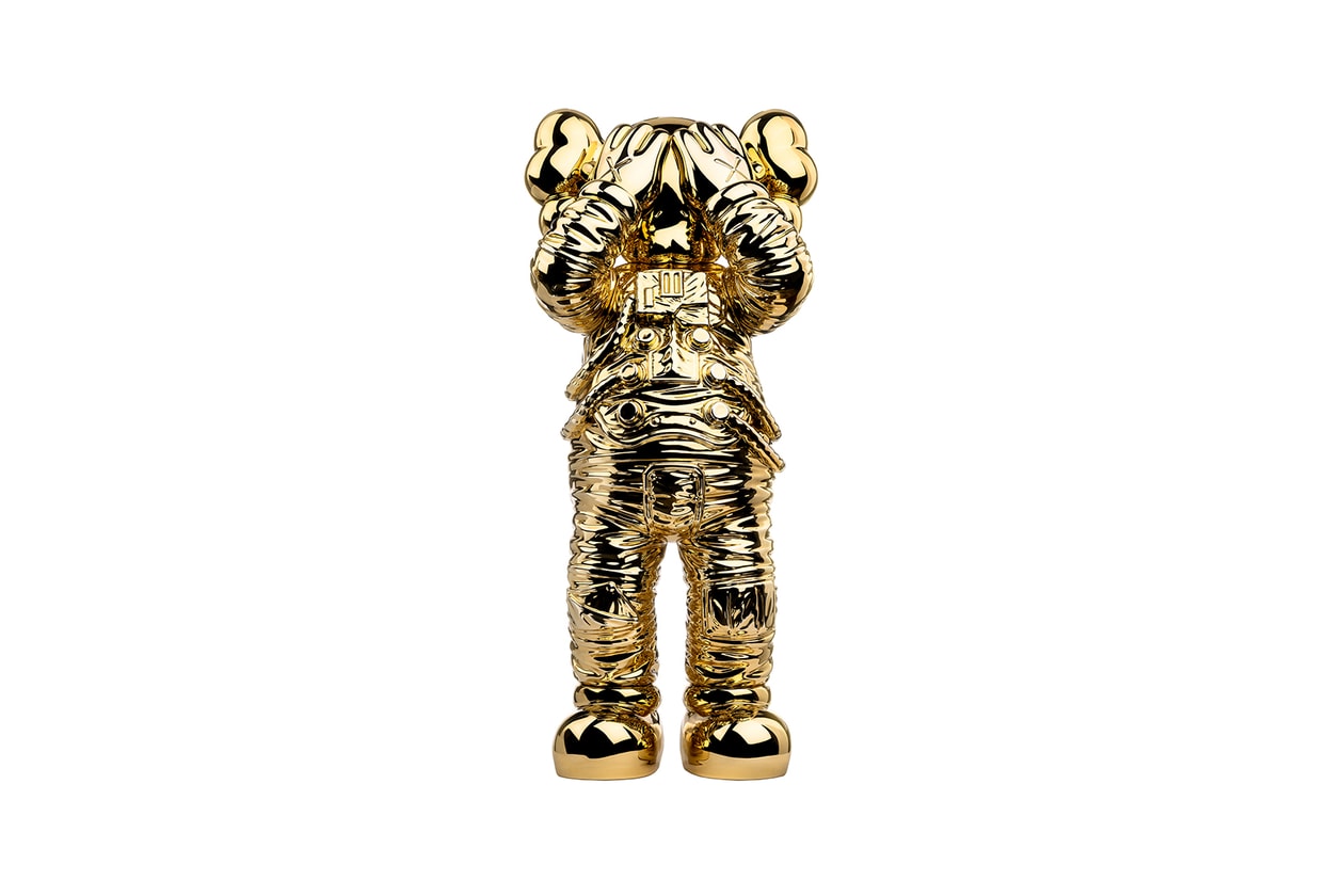 kaws holiday space allrightsreserved collaboration companion figure collectibles gold sculpture 