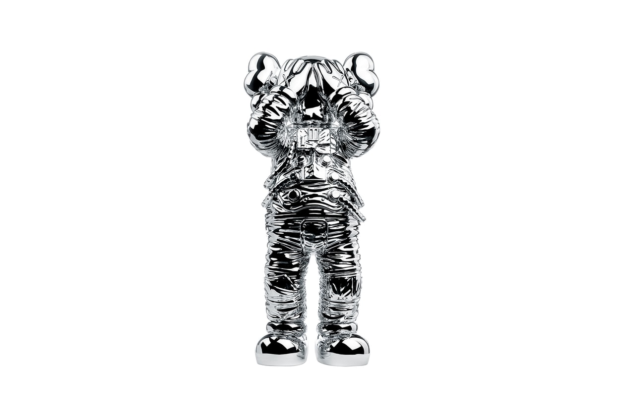 kaws holiday space allrightsreserved collaboration companion figure collectibles gold sculpture 