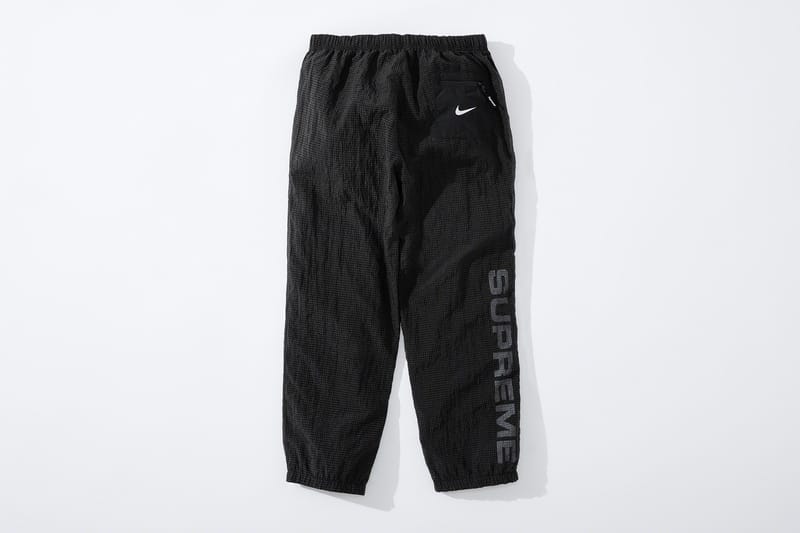 nike supreme track pants
