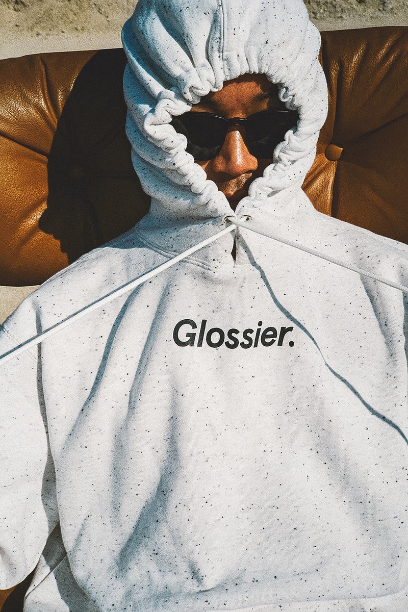 glossier glossiwear limited edition terrazzo hoodie gray sneaker white duffle bag