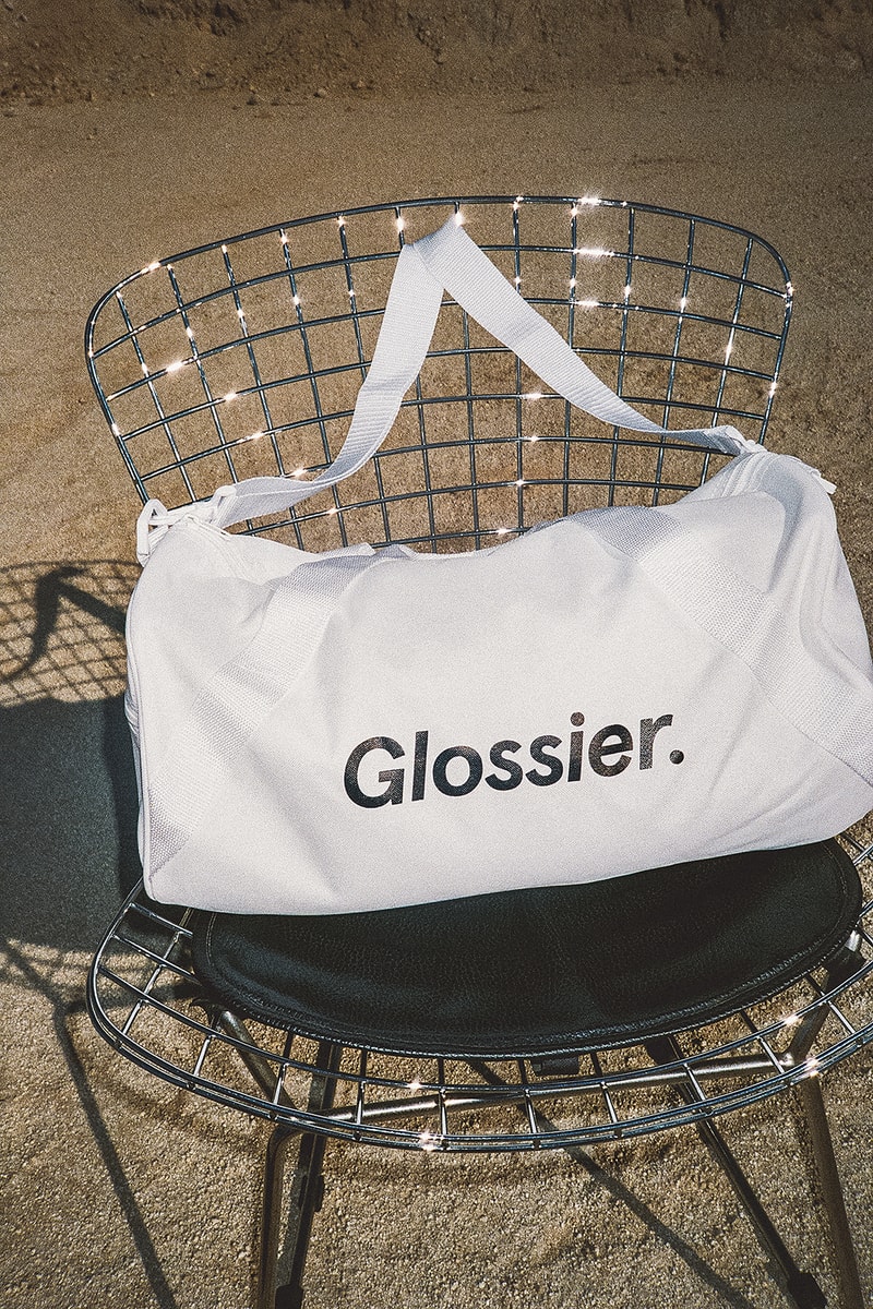 glossier glossiwear limited edition terrazzo hoodie gray sneaker white duffle bag