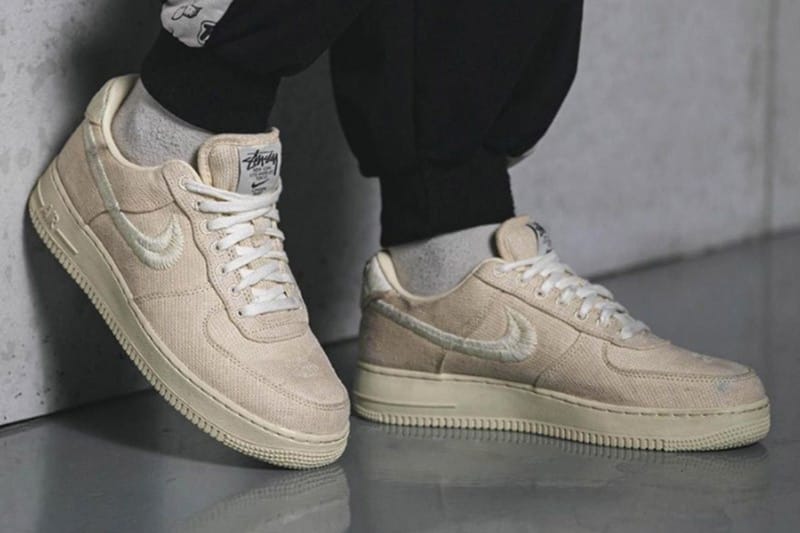 Here's an On-Foot Look at Stussy x Nike's Air Force 1 in "Fossil Stone" and "Black"
