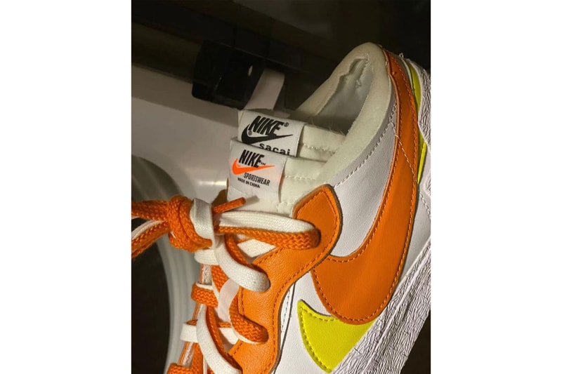 sacai nike blazer low magma orange yellow white collaboration details close up swoosh tongue tag