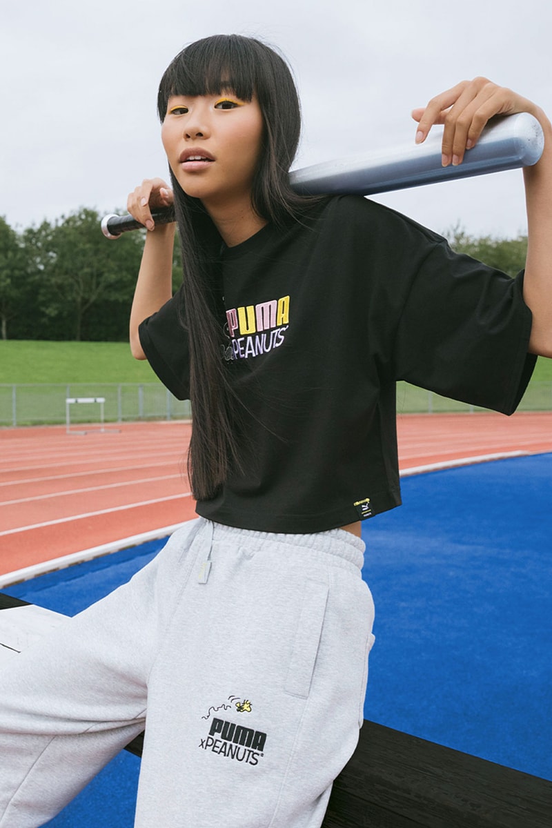 peanuts puma collaboration womenswear woodstock black t-shirt gray sweatpants logo