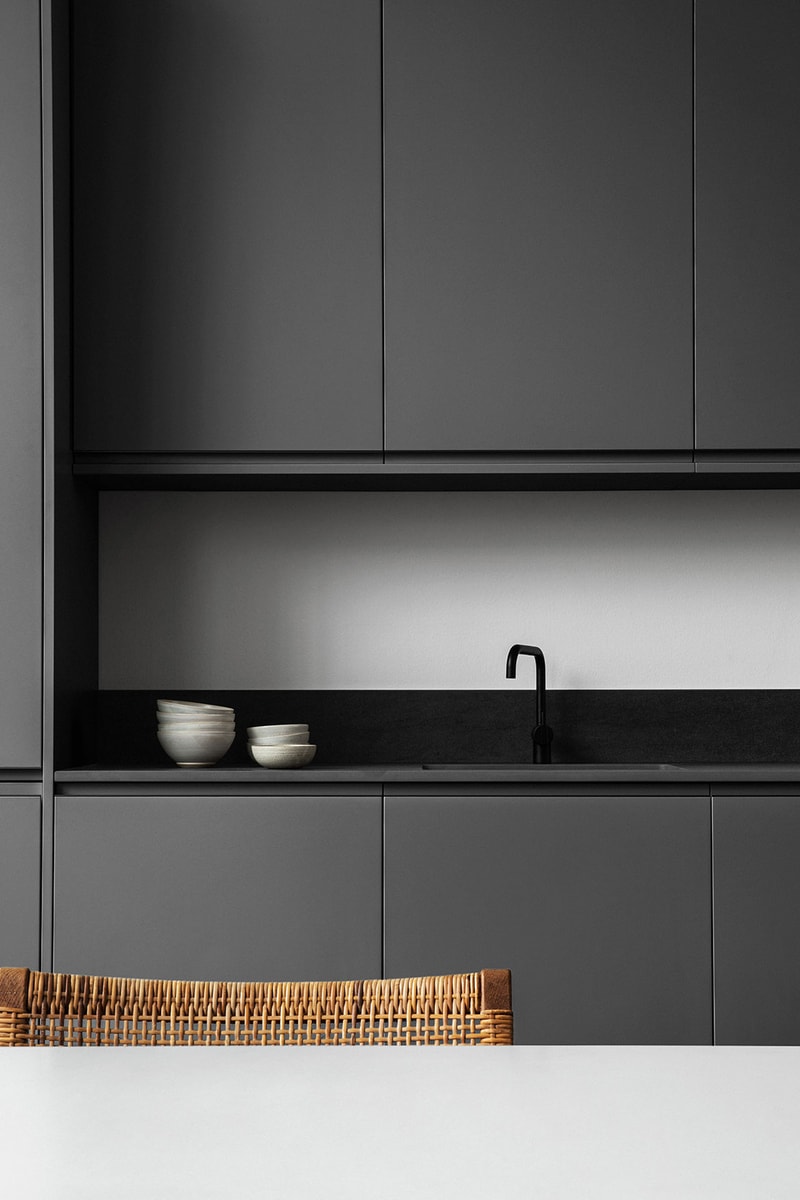 reform norm architects home kitchen interior design collaboration dark gray grey countertop sink
