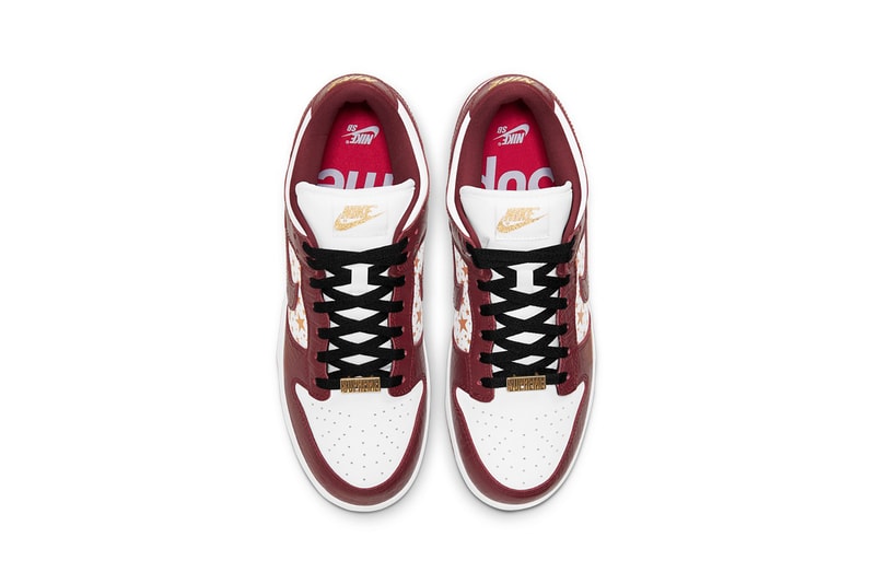 supreme nike sb dunk low collaboration sneakers barkroot brown burgundy red white gold stars black laces insole