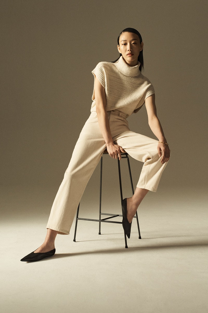cos spring summer 2021 ss21 sustainable denim collection jeans sora choi sweater vest chair sitting