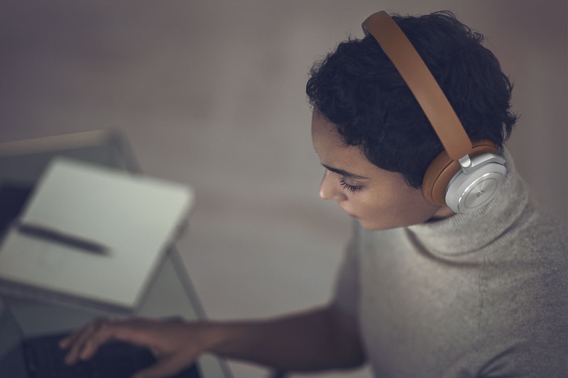 bang and olufsen beoplay hx headphones listening music timber tan brown