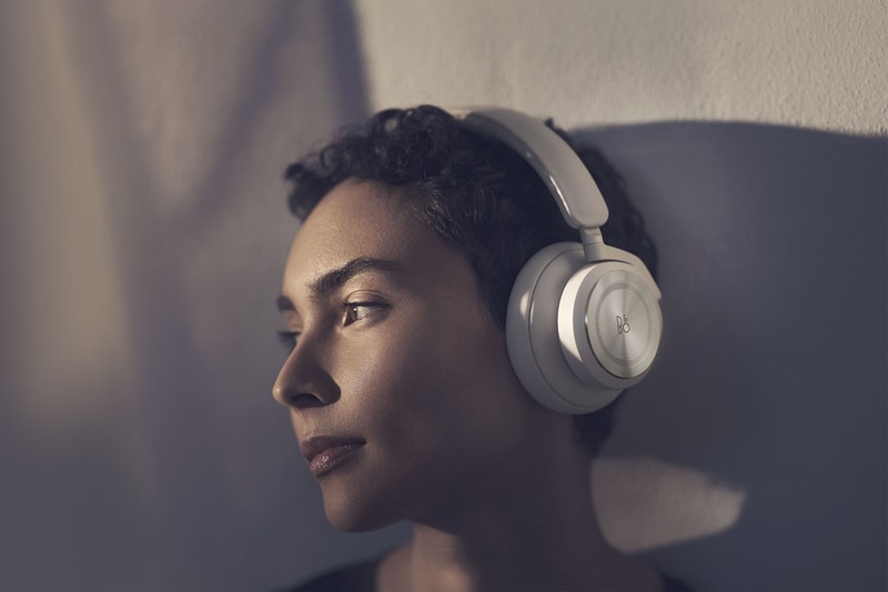 bang and olufsen beoplay hx headphones listening music sand beige
