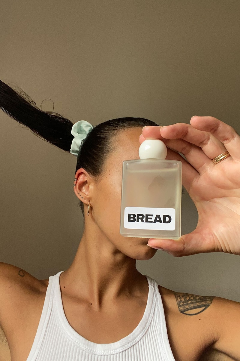 bread macadamia hair body oil pure cold pressed australian bottle model hand hair scrunchie