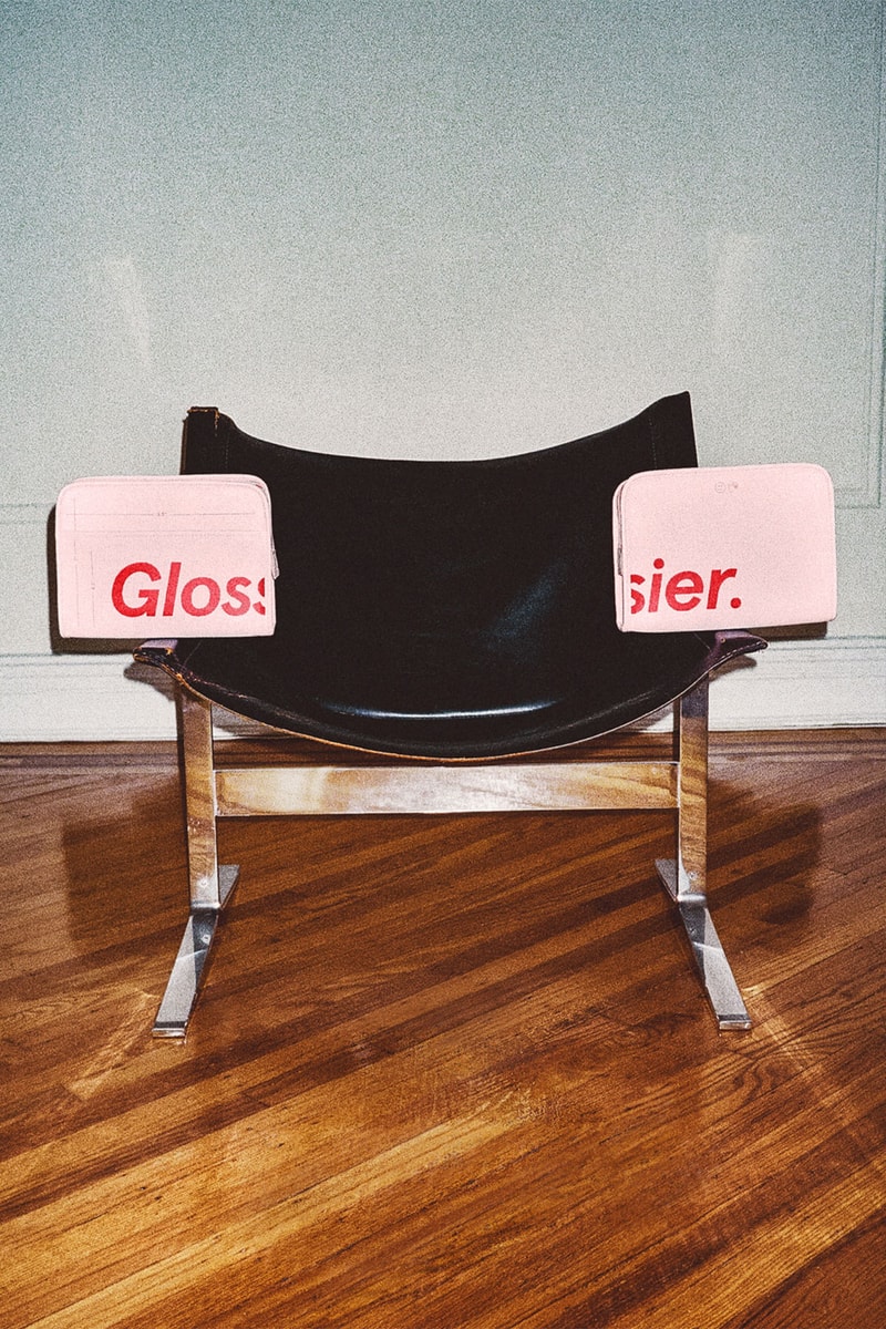 glossier the beauty bag pink red makeup skincare pouch chair home interior decor