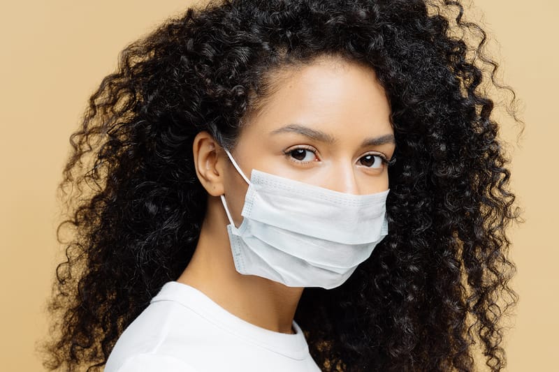 "Maskne" Is Real — Here's How To Deal With It, According to Skincare Experts