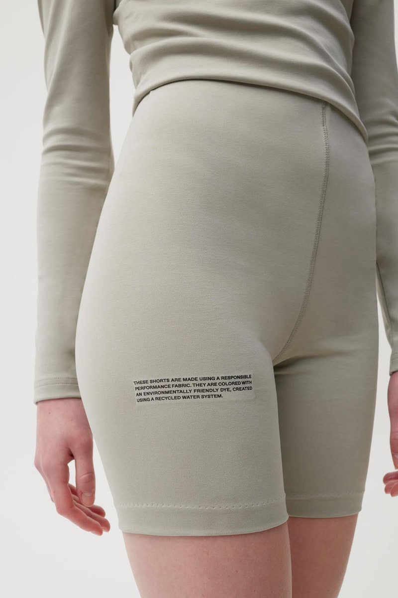 pangaia roica stretch athleisure sustainable collection turtleneck top bike shorts gray beige