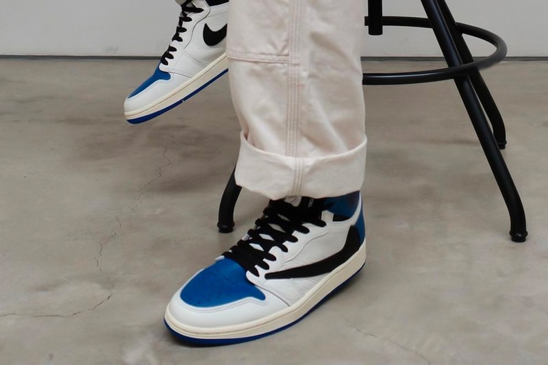 travis scott fragment design air jordan 1 aj1 high og military blue closer look trousers pants stool sitting
