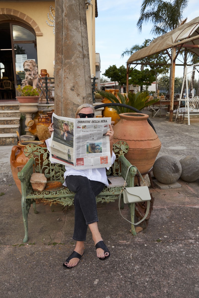 atp atelier 10th anniversary collection campaign assisi baguette handbag newspaper bench