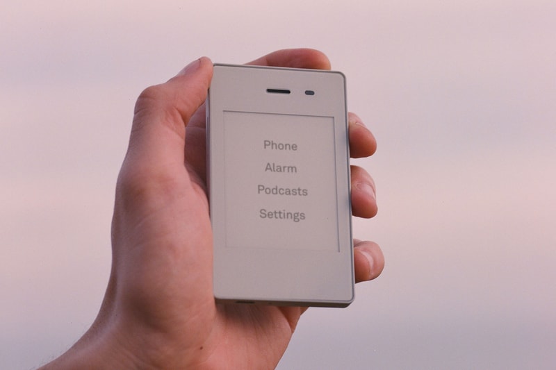 the light phone ii minimalist design tech hand sky