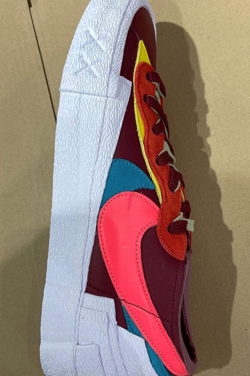kaws sacai nike blazer low collaboration red burgundy details swoosh