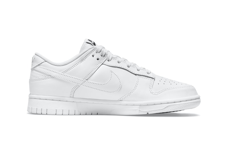 nike dunk low triple white sneakers minimal colorway footwear shoes kicks lateral