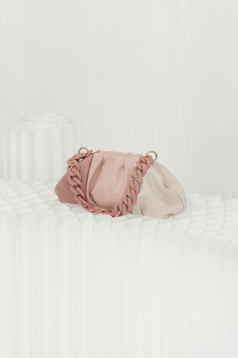 Noiranca dusty pink bag on white table