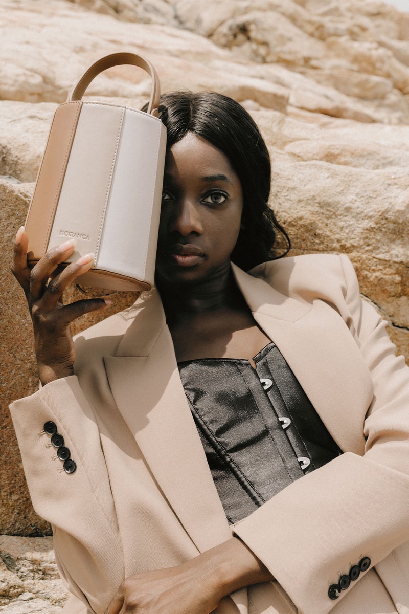 Noiranca Brown Bag on model in desert