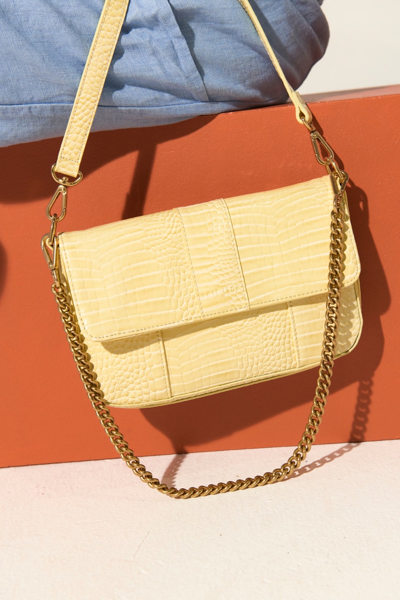 Brie Leon yellow vegan leather handbag chain