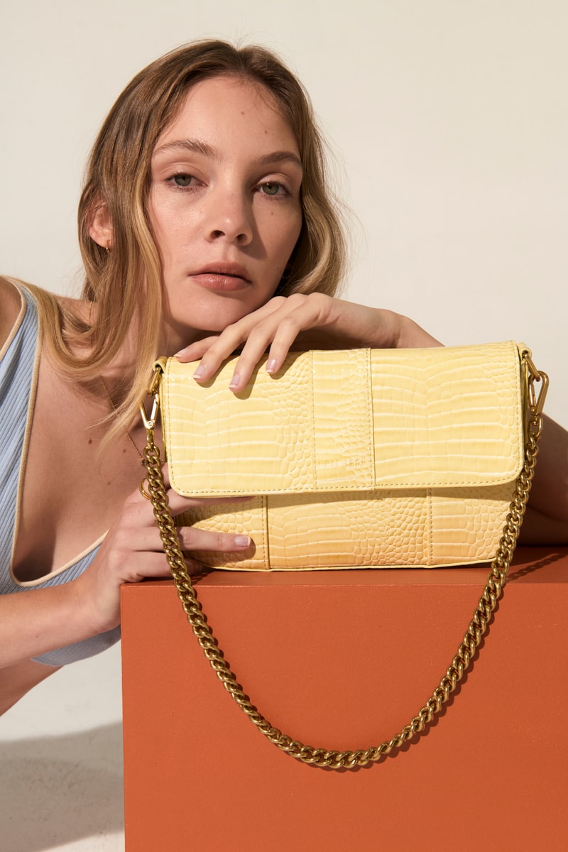 Brie Leon yellow vegan leather handbag chain