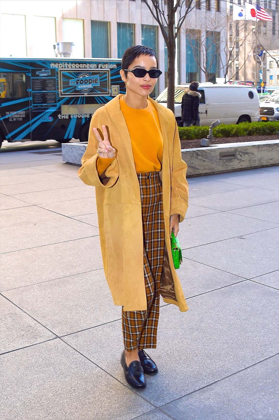 Zoë Kravitz outfits Street Style actor celebrity brown shirt sunglasses