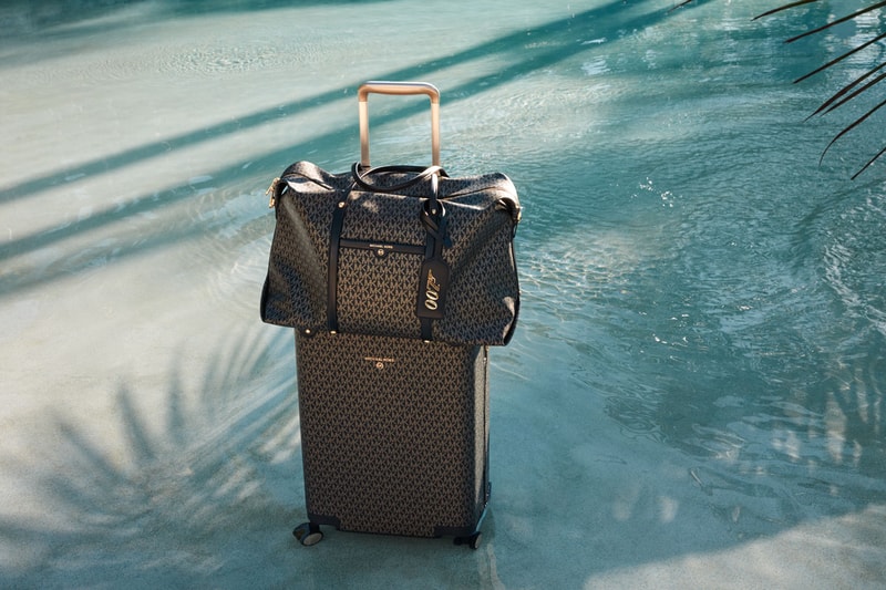 michael michael kors 007 bond exclusive limited edition capsule collection cindy bruna bella hadid luggage handbags swimwear footwear ready-to-wear pieces bond signature print suitcase beck weekender bag