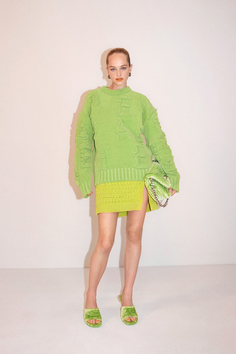 bottega veneta resort 2022 green sweater yellow skirt clutch