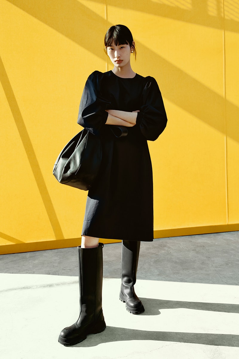 cos lunar new year black long sleeved midi dress black boots handbag
