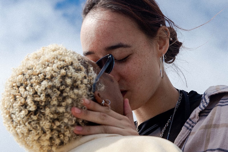 Queer couples exchanging a kiss