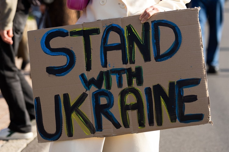 Protestors at Milan Fashion Week Draw Attention to Ukraine-Russia Conflict