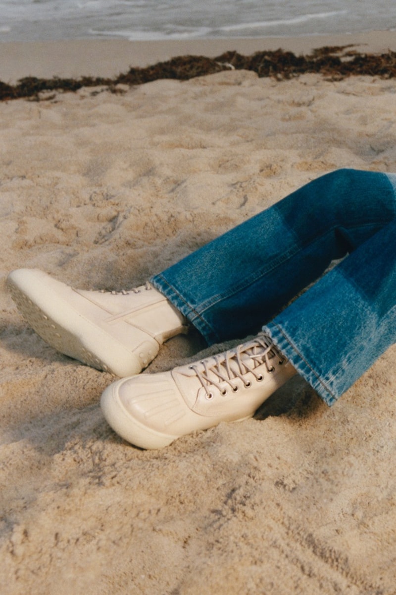 naomi campbell model moncler jacket palm angels tods loafers