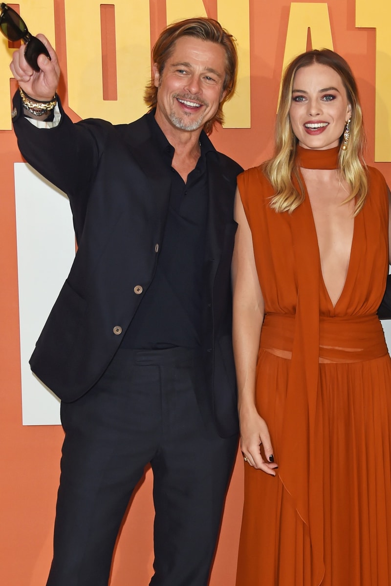 margot robbie brad pitt babylon sneaking in kiss 