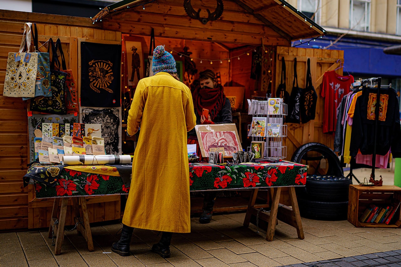 christmas market stalls hot chocolate toys gifts coffee wine