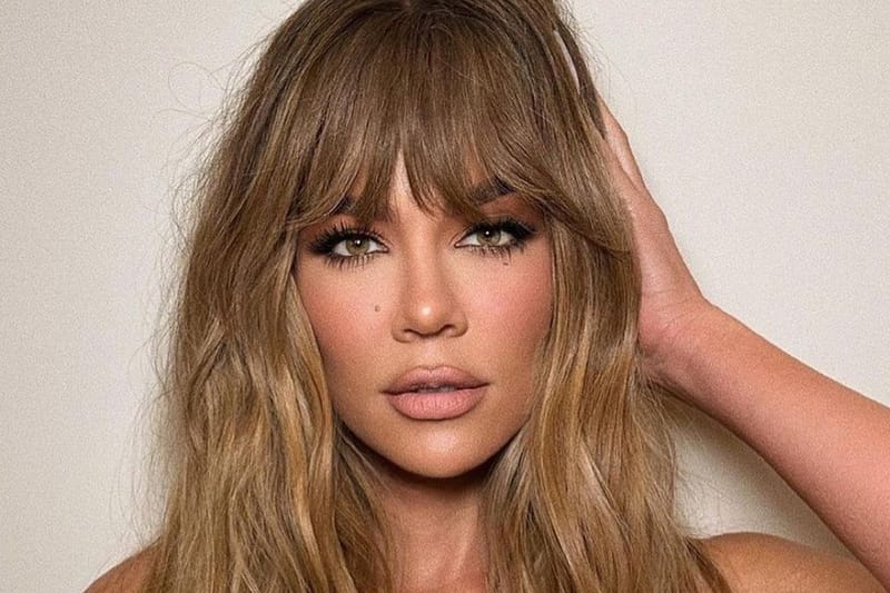 Leave It to Khloé Kardashian To Eat Up Pamela Anderson's Iconic, '90s G-String Updo