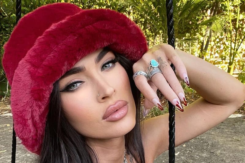 Megan Fox Shows off Her "Jungle Fever" Side With White XL White Feathered Extensions