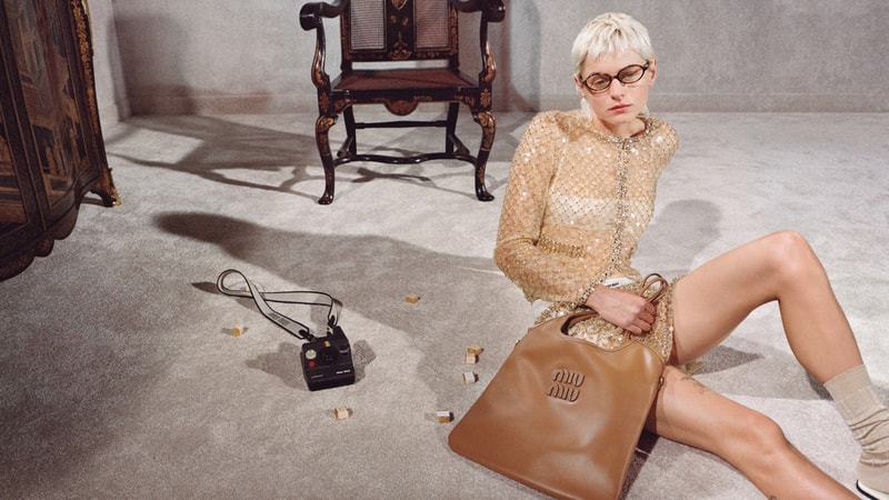 emma corrin miu miu holiday christmas
