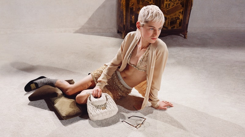emma corrin miu miu holiday christmas