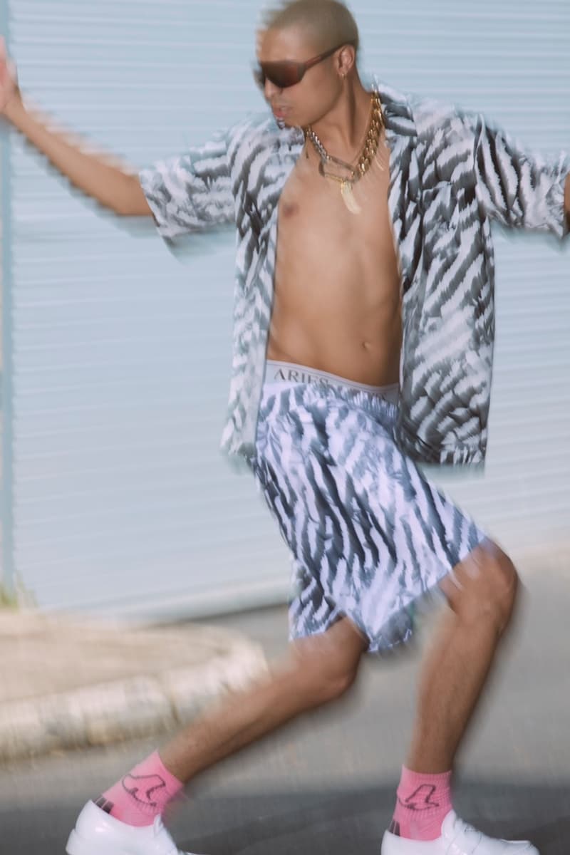 aries campaign spring summer models paparazzi cameras blurry 