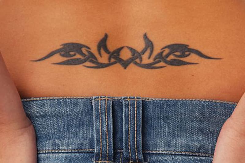 Tramp stamp, tattoo, beauty, back tattoo, '00s tattoo trends