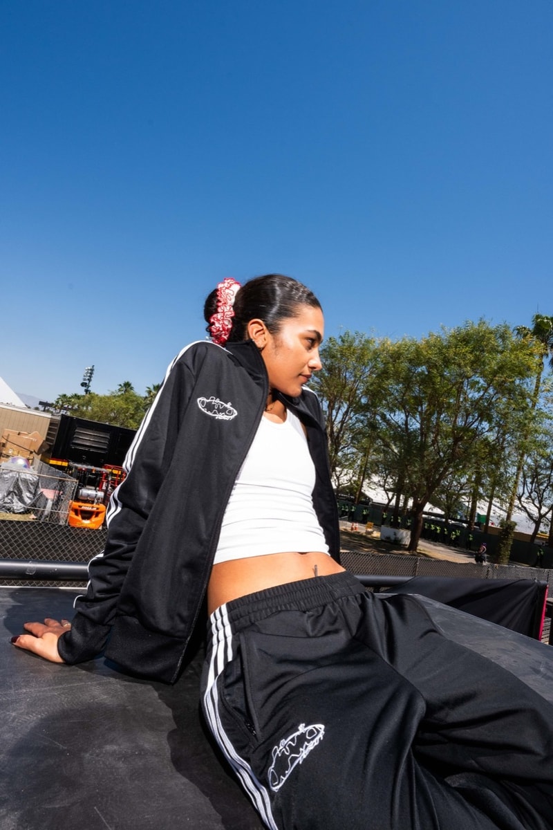 olivia dean adidas tracksuit track pants tshirt music artist performer